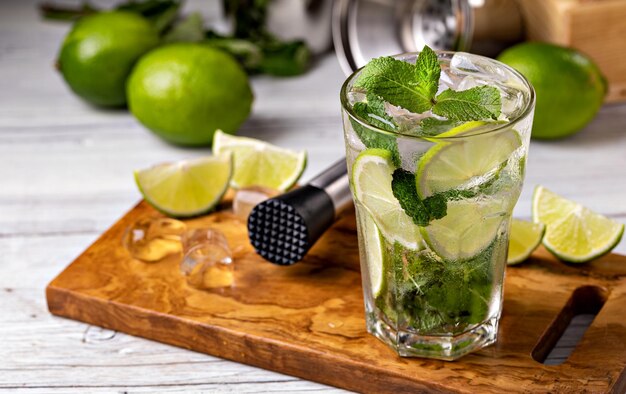 Mojito cocktail with lime mint and ice