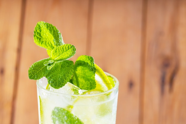 Mojito cocktail on wooden boards