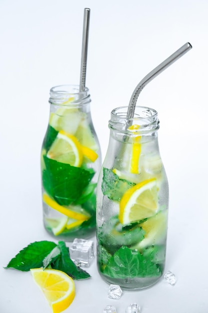 Mojito refreshing cocktail eco metal drinking straw alcohol drink Lemonade with lemon and mint leave