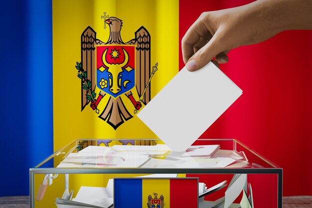 Moldova flag hand dropping ballot card into a box voting election concept