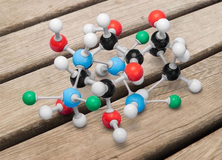 Photo molecular structure model on wooden background