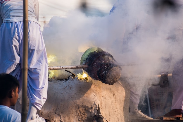 The molten metal for Casting of Buddha statue