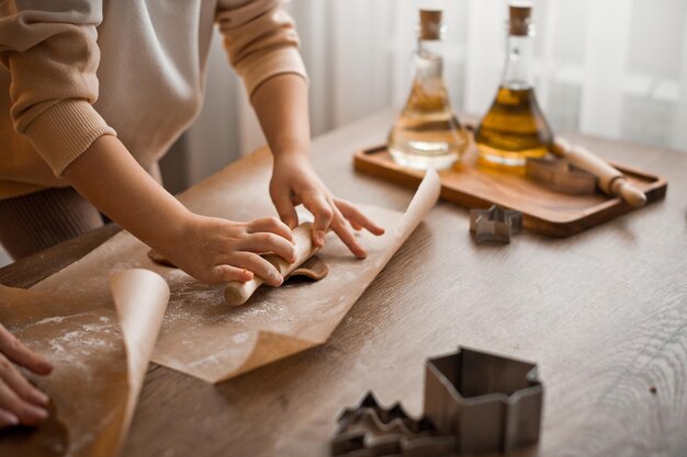 Mom and daughter are making cookies on the kitchen table 4304