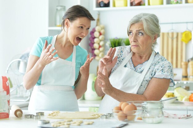 Mom and daughter cook