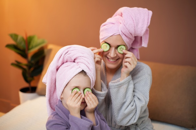 Mom and daughter doing spa treatments at home