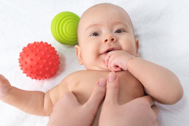 Mom does exercises with newborn