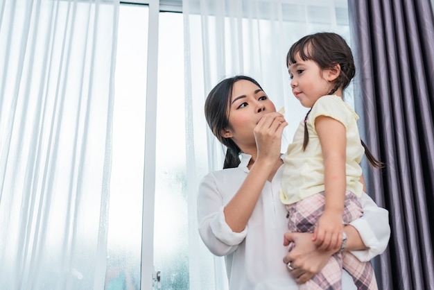 Mom feeding kids with potato chip. teacher feeding student with snack. back to school and