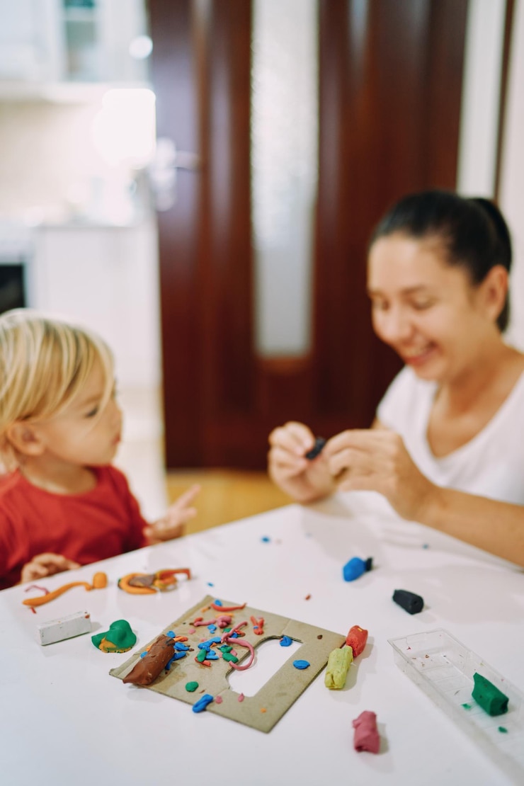 mom-her-little-daughter-sculpt-different-figures-from-colored-plasticine-while-sitting_278455-23289.jpg?uid=R182350357&ga=GA1.1.811252693.1744599237&semt=ais_hybrid&w=740