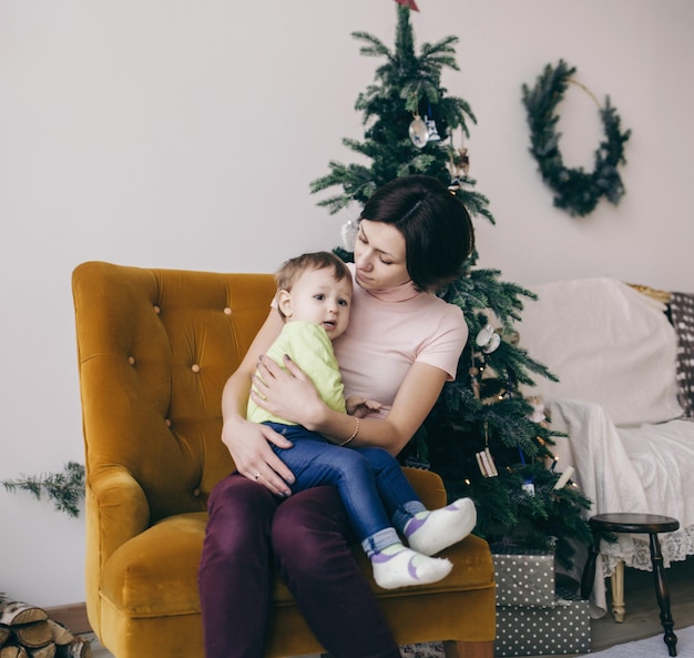 Mom hugging little girl