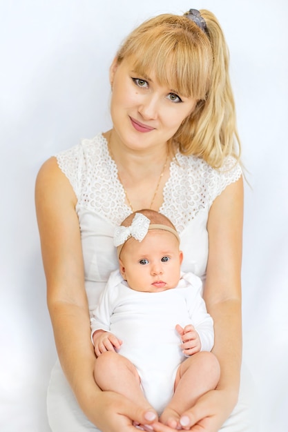 Mom is holding a newborn baby