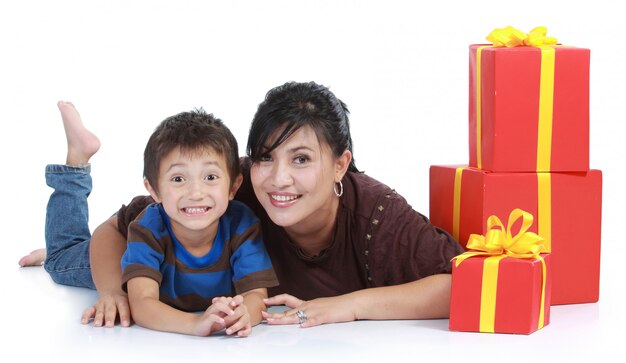 Mom and kid with a stack of gift.