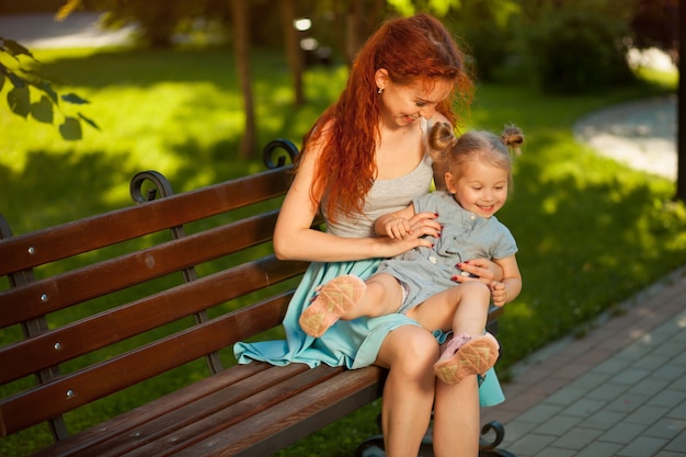 Mom playing with a child in the Park