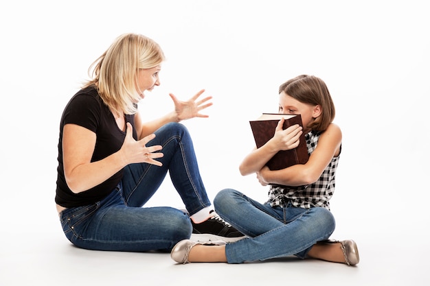 Photo mom scolds the daughter of a teenager. conflict of generations.