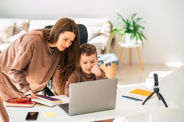 Mom and son doing school homework