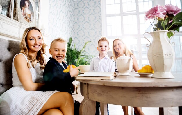 Moms and kids spending time in the living room