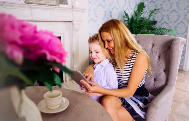 Moms and kids spending time in the living room