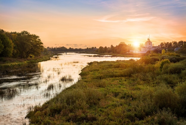 Photo monastery on the river in ostrov in pskov