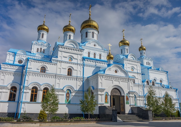 Monastery in the town of Pochaev on the sky background