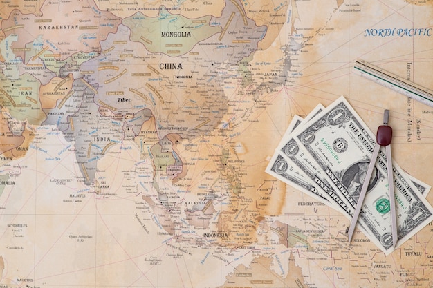 Money and angle on the map of the world.