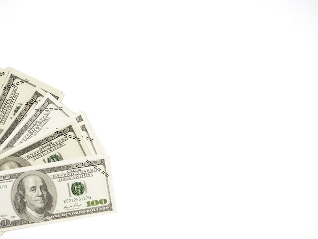 Фото Деньги банкноты доллар вид сверху на белом изолированных копией пространства