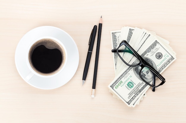 Money cash glasses pen and coffee cup