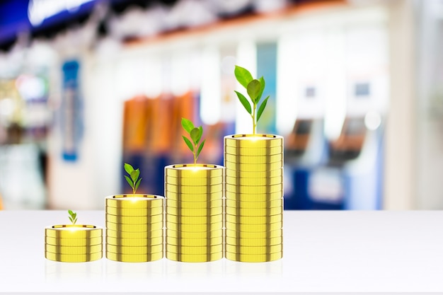 Photo money coin for growing your business  people are using stock chart innovative technology. mixed media, digital smartphone and online concept. plant seedlings growth