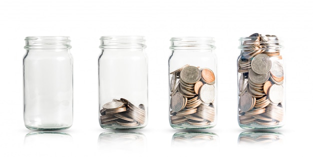 Money coins growing in jar. 