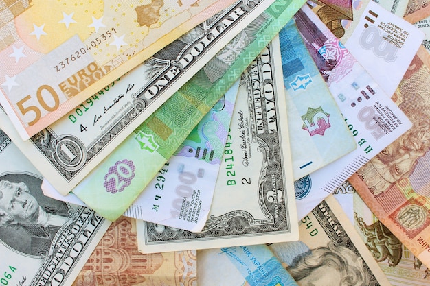 Money from different countries: dollars, euros, hryvnia, rubles