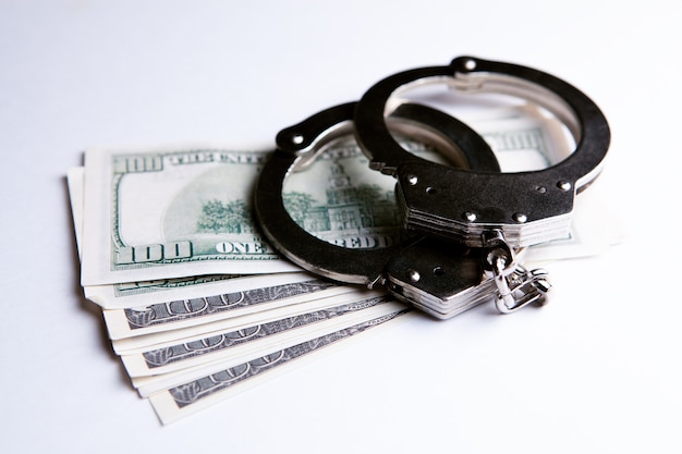 Money and handcuffs bribery of the authorities