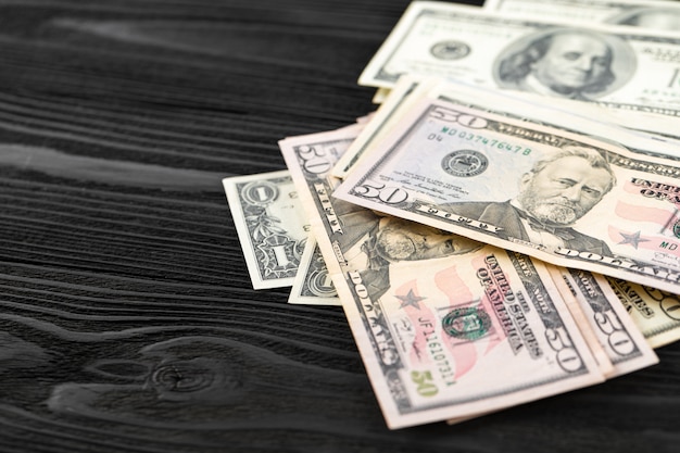 Money isolated on a wooden background