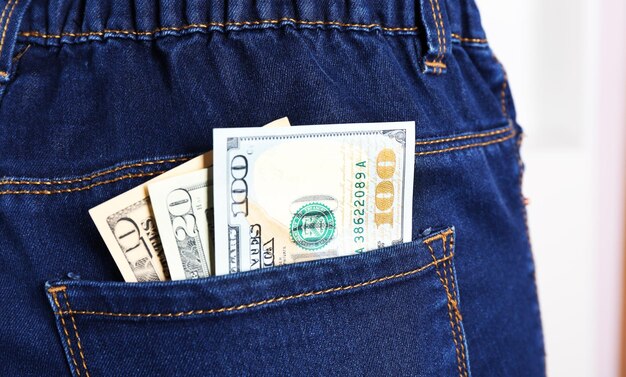 Money in the jeans pocket close up