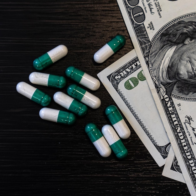 Money and pills, health pill tablet cash and dollar capsule pharmaceutical