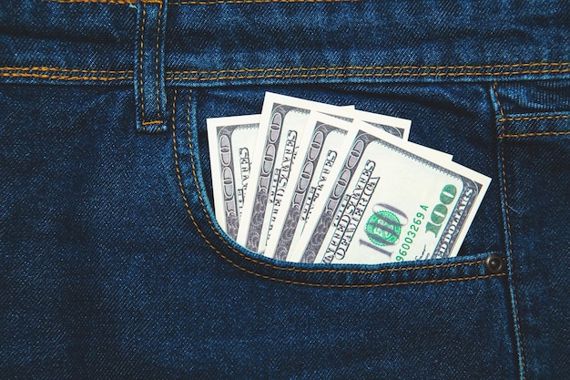 Money in the pocket of blue jeans