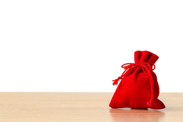 Money in Red bag for Chinese New Year on white background