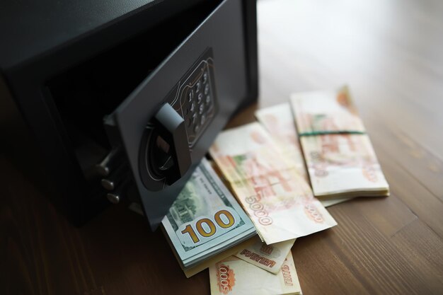 Money in a residential safe closeup photo deposit in cash\
russian rubles are in the safe