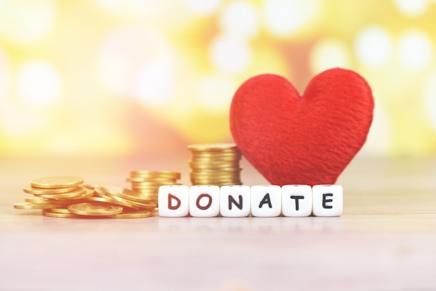 Money saving with red heart for donate and philanthropy