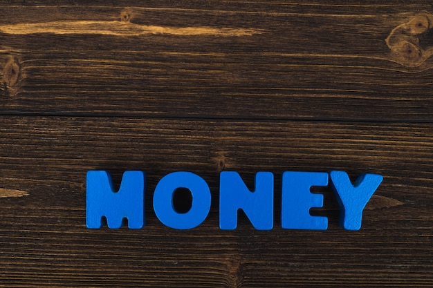 MONEY text letters word on wood