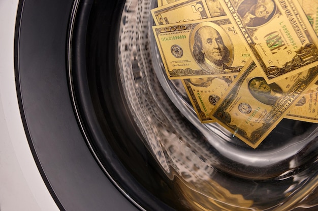 Money in washing machine, closeup view. Money washing. Money laundering