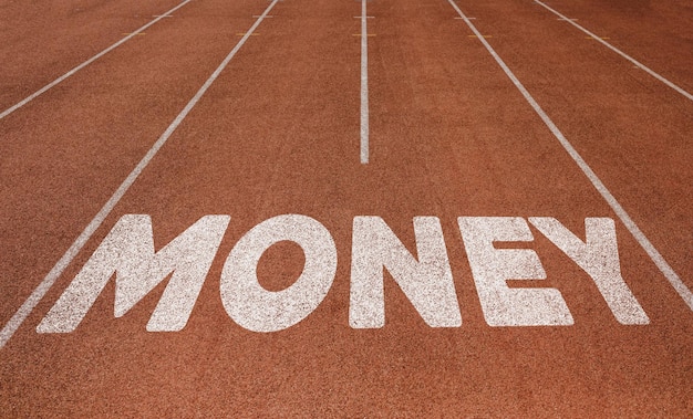 Money written on running track New Concept on running track text in white color