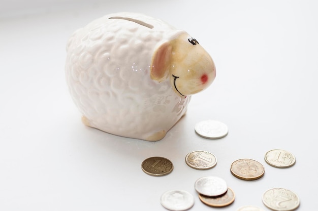 Moneybox and Russian coins lying close