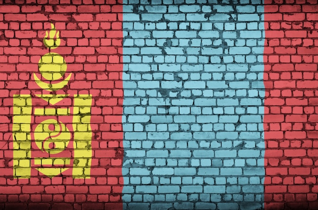 Mongolia flag is painted onto an old brick wall