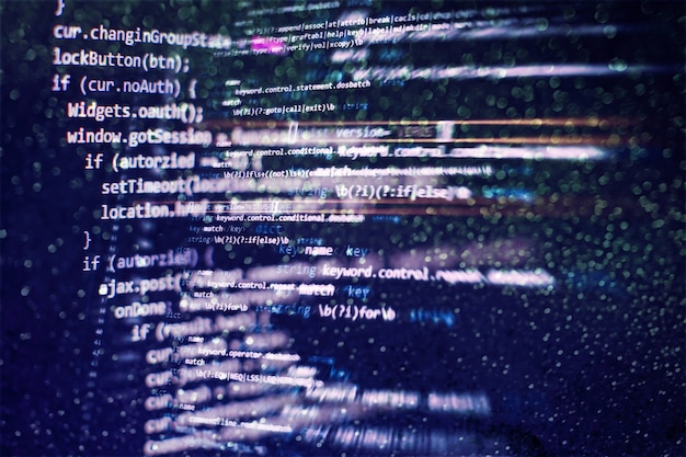 関数のソースコードのクローズアップを監視します。ラップトップでプログラミング関数を記述します。ビッグデータとモノのインターネットのトレンド。