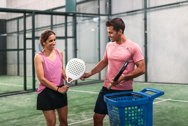 Monitor teaching padel class