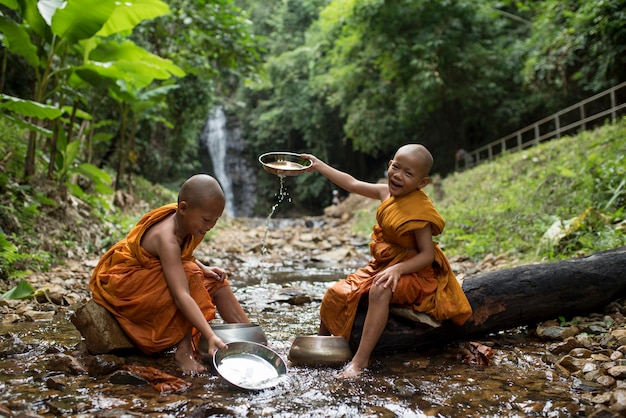 Monk boy play in thailand