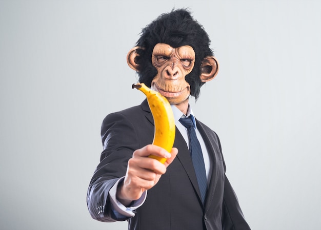 Monkey man holding a banana