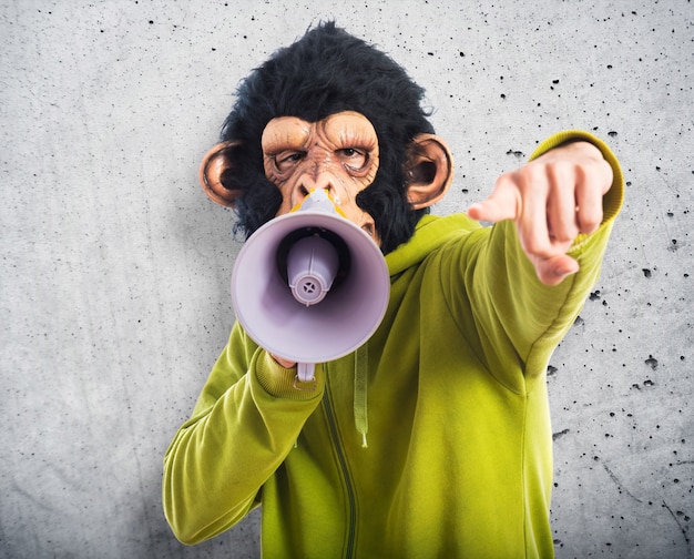 Monkey man shouting by megaphone