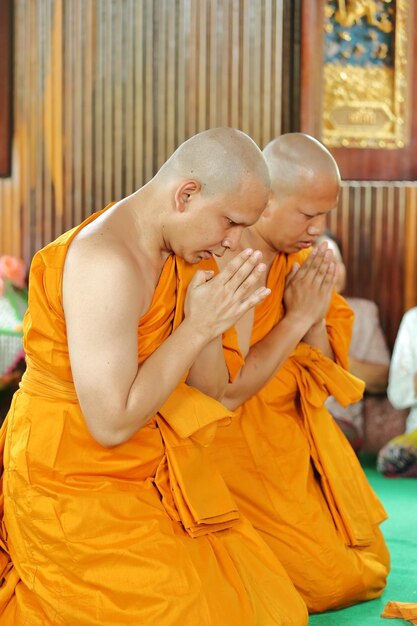 Monks having ordination ceremony at temple