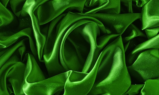Monochrome crumpled fabric of green color top viewflat lay