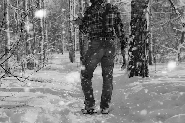 Monochrome landscape man with axe