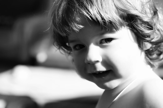 Monochrome portrait son with mother